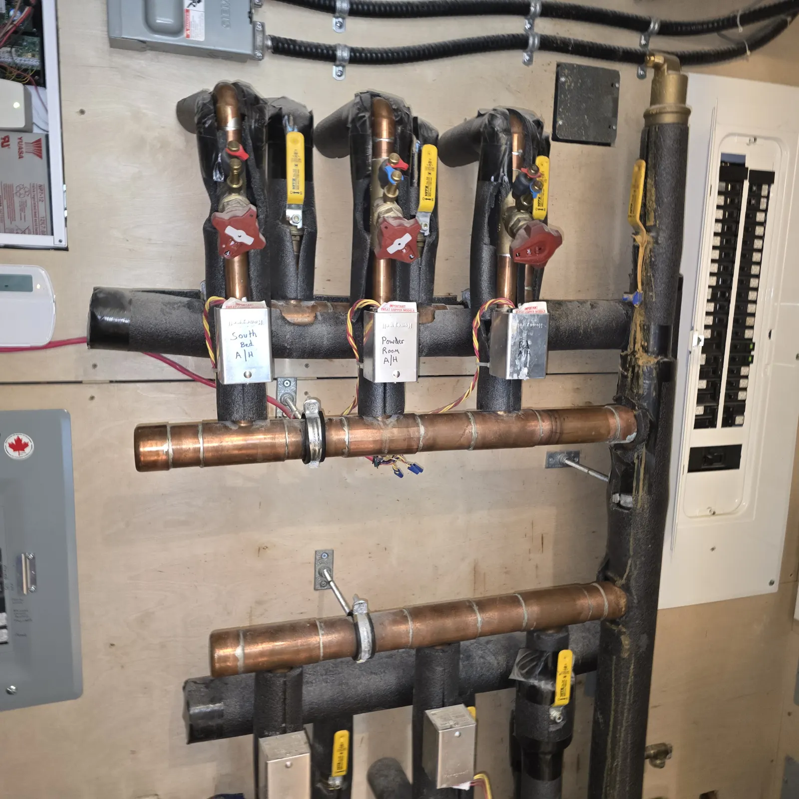 Before: old copper headers, zone valves and radiant manifold