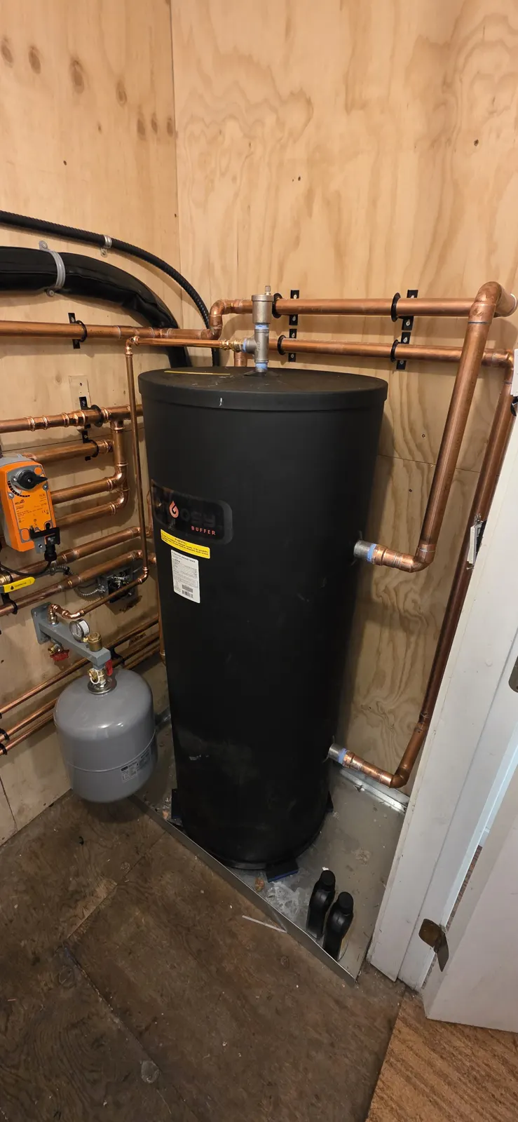 After: close-up of the buffer tank and piping