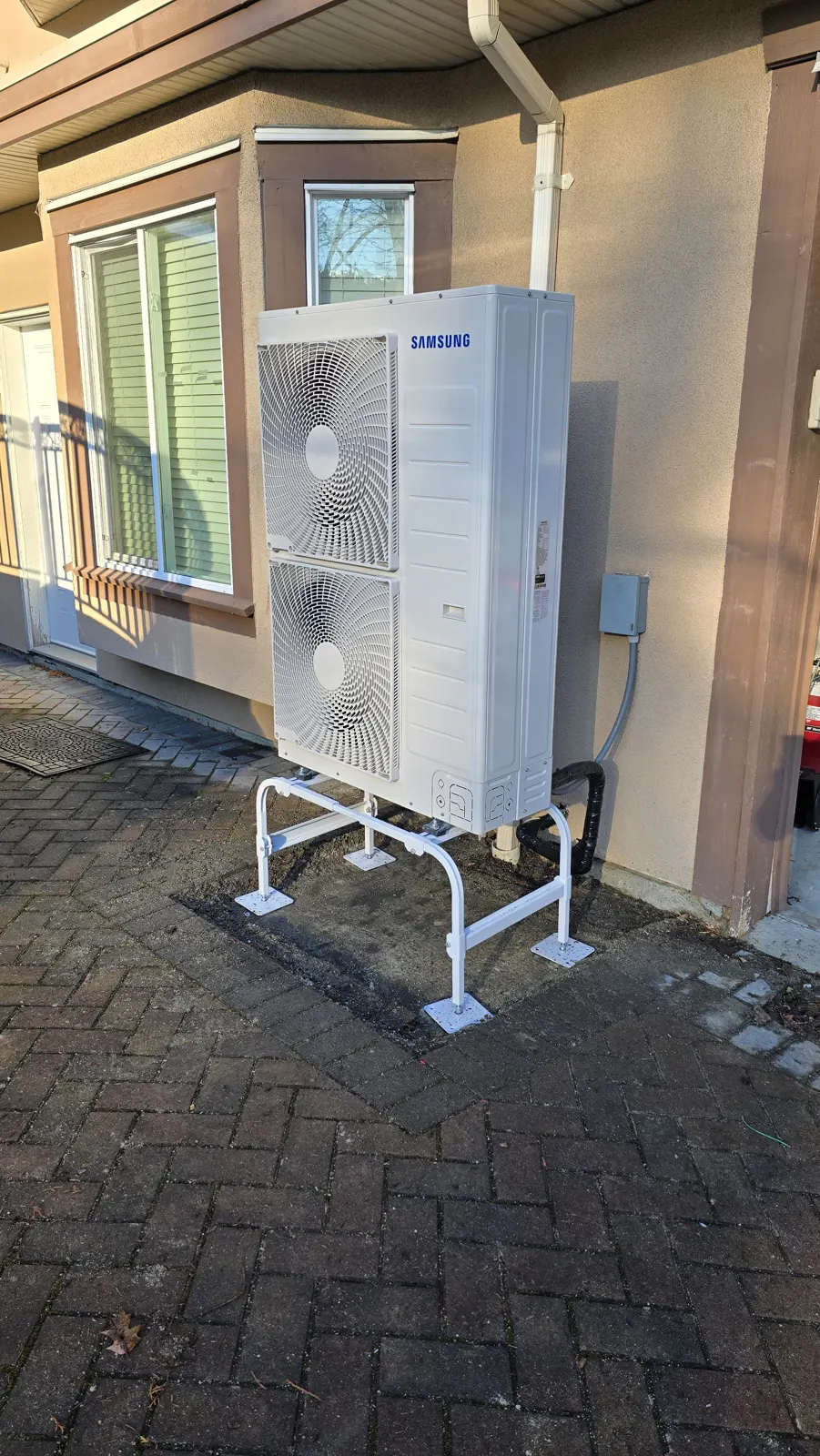 New Samsung inverter outdoor unit on a white stand